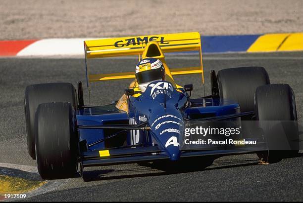 Jean Alesi from France drives the Tyrrell Racing Organisation Tyrrell 018 Ford Cosworth DFR V8 to fourth place on his Formula 1 debut during the...