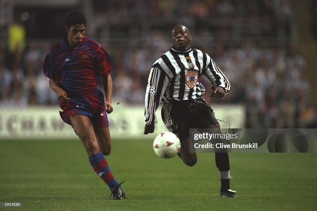 Michael Reiziger of Barcelona and Faustino Asprilla of Newcastle United
