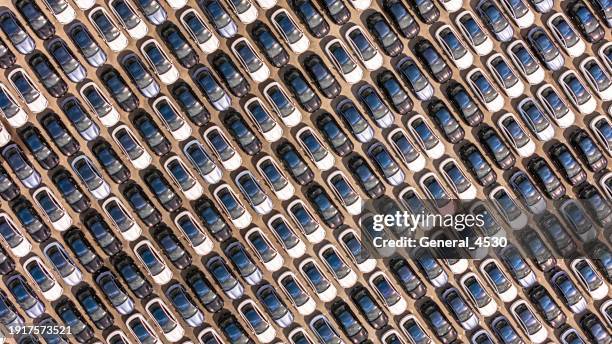 aerial top view cars export terminal in export and import business and logistics. - industrial district stock pictures, royalty-free photos & images