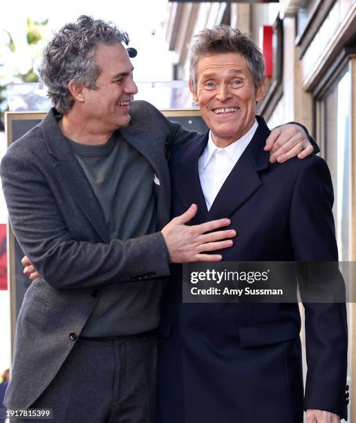 Mark Ruffalo and Willem Dafoe attend the Hollywood Walk of Fame Star Ceremony for Willem Dafoe on January 08, 2024 in Hollywood, California.
