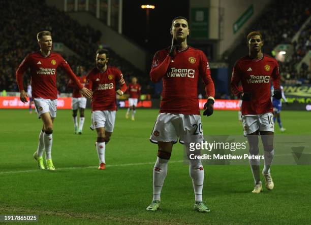 Diogo Dalot of Manchester United celebrates scoring their first goal during the Emirates FA Cup Third Round match between Wigan Athletic and...