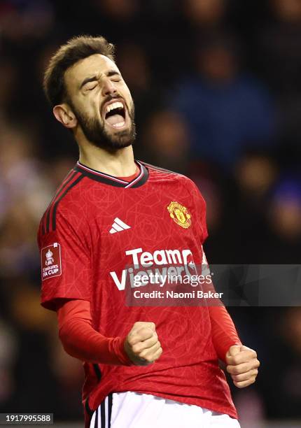 Bruno Fernandes of Manchester United celebrates scoring his team's second goal from the penalty spot during the Emirates FA Cup Third Round match...