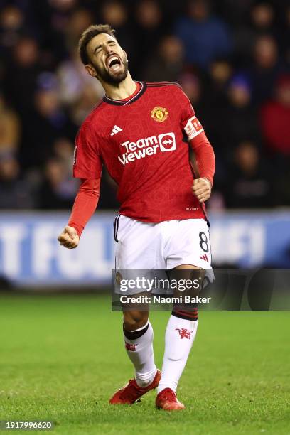 Bruno Fernandes of Manchester United celebrates scoring his team's second goal from the penalty spot during the Emirates FA Cup Third Round match...