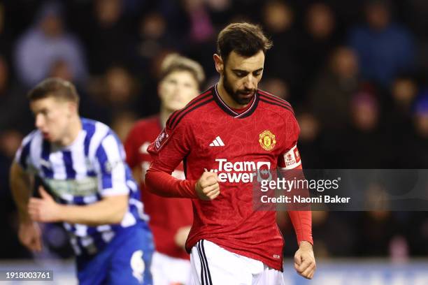 Bruno Fernandes of Manchester United celebrates scoring his team's second goal from the penalty spot during the Emirates FA Cup Third Round match...