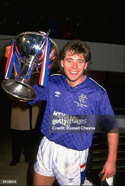 Ally McCoist of Rangers celebrates with the trophy after the Skol Cup final match between Rangers and Aberdeen at Hampden Park in Glasgow, Scotland....