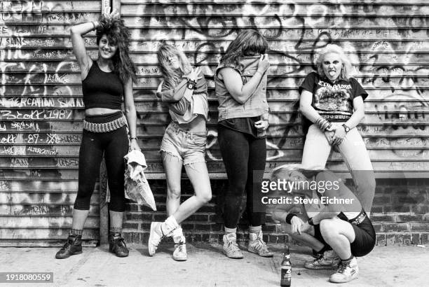 Members of American Heavy Metal band Wench pose against graffiti-covered grates , New York, New York, August 1, 1988. , New York, New York, August 1,...