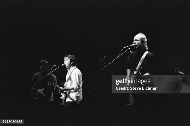 American Rock musicians Craig Fuller and Paul Barrere , of American band Little Feat, both play guitars as they perform on stage at the Beacon...