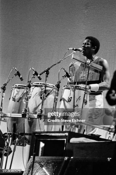American Rock musician Sam Clayton, of band Little Feat, plays congas as he performs on stage at the Beacon Theatre, New York, New York, October 12,...