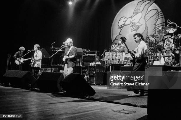 Members of American Rock band Little Feat perform on stage at the Beacon Theatre, New York, New York, October 12, 1988. Pictured are, from left, Fred...