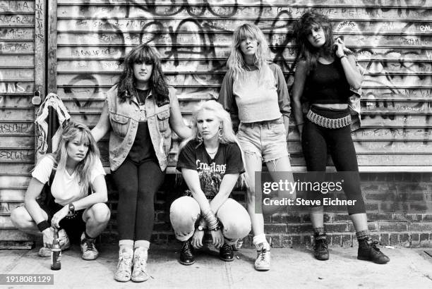 Members of American Heavy Metal band Wench pose against graffiti-covered grates , New York, New York, August 1, 1988. , New York, New York, August 1,...