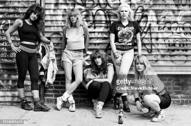 Members of American Heavy Metal band Wench pose against graffiti-covered grates , New York, New York, August 1, 1988. , New York, New York, August 1,...