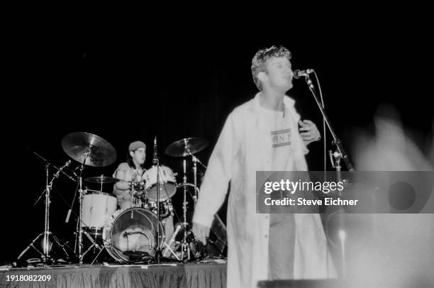 Rock musicians Aaron Comess , on drums, and vocalist Chris Barron, both of the band Spin Doctors, perform on stage at Columbia University, New York,...