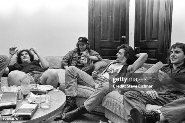 View of the members of American Rock band Blues Traveler in their Brooklyn home, New York, New York, March 1, 1990. Pictured are, from left, John...