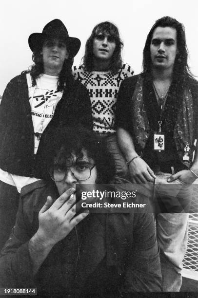 Portrait of the members of American Rock band Blues Traveler as they pose at the South Street Seaport, New York, New York, September 19, 1989....