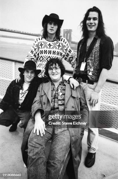 Portrait of the members of American Rock band Blues Traveler as they pose at the South Street Seaport, New York, New York, September 19, 1989....