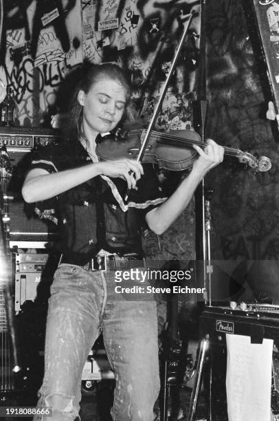 American Alternative Rock musician Morgan Fichter plays violin as she performs onstage, with the band Camper Van Beethoven, at CBGB, New York, New...