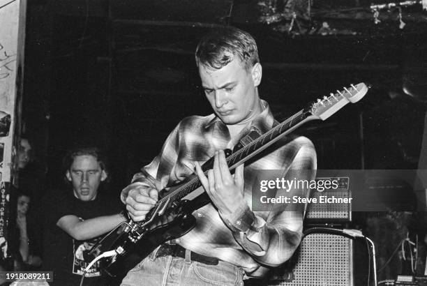 American Alternative Rock musician David Lowery plays guitar as he performs onstage, with the band Camper Van Beethoven, at CBGB, New York, New York,...