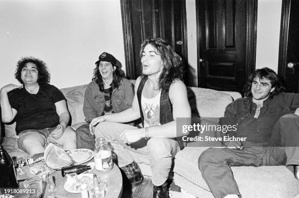 View of the members of American Rock band Blues Traveler in their Brooklyn home, New York, New York, March 1, 1990. Pictured are, from left, John...