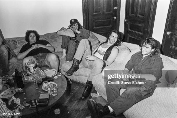 View of the members of American Rock band Blues Traveler in their Brooklyn home, New York, New York, March 1, 1990. Pictured are, from left, John...