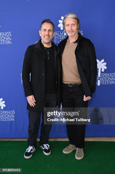 Filmmaker Nikolaj Arcel and Mads Mikkelsen attend the Best International Feature Film Panel at the 35th annual Palm Springs International Film...