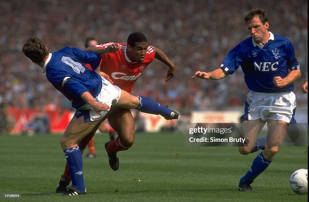 Kevin Ratcliffe, Dave Watson of Everton and John Barnes of Liverpool