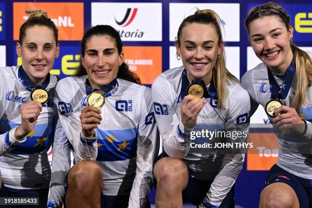 First placed Italy's Vittoria Guazzini , Italy's Elisa Balsamo, Italy's Letizia Paternoster and Italy's Martina Fidanza celebrate and pose with gold...
