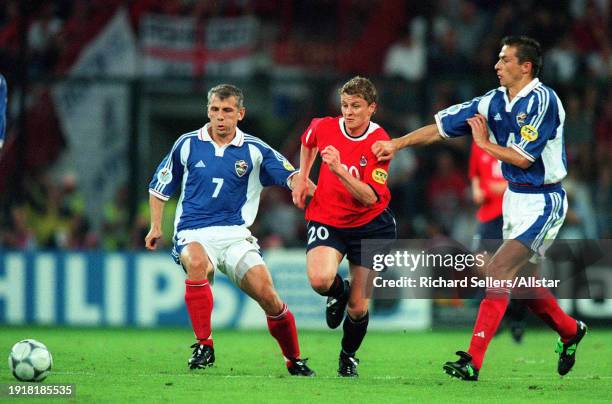 June 18: Vladimir Jugovic, Slavisa Jokanovic of Yugoslava and Ole Gunnar Solskjaer challenge during the UEFA Euro 2000 Group C match between Norway...
