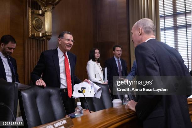 Sen. John Barrasso , Ranking Member of the Senate Energy and Natural Resources Committee, greets witness David M. Turk, Deputy Secretary of theU.S....