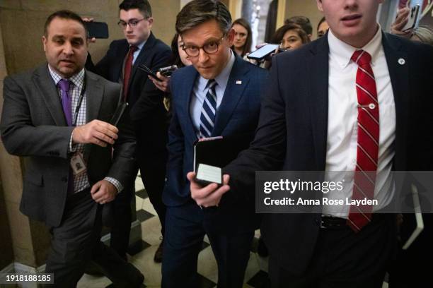 House Speaker Mike Johnson walks back to his office following a vote in the U.S. Capitol on January 11, 2024 in Washington, DC. Earlier in the day,...