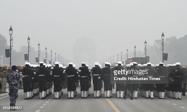 Indian Coast Guard Contingent during rehearsals for the upcoming Republic Day parade amid fog on a cold winter morning at Kartavya Path on January...