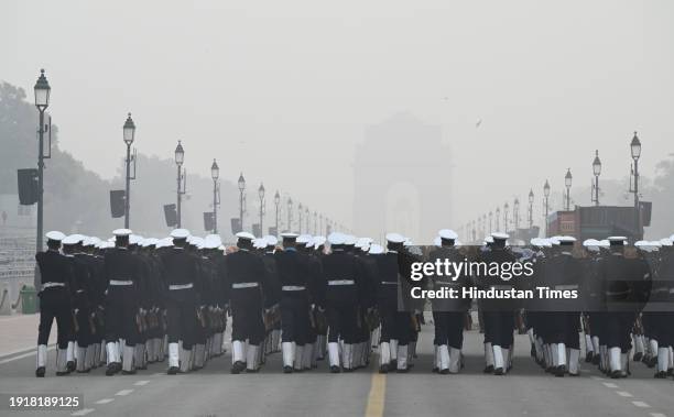 Indian Coast Guard Contingent during rehearsals for the upcoming Republic Day parade amid fog on a cold winter morning at Kartavya Path on January...