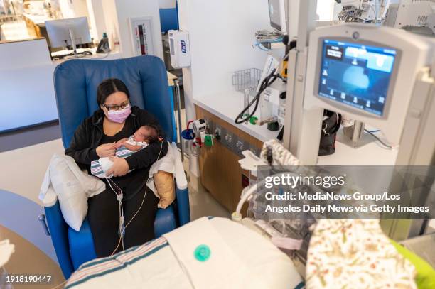 Los Angeles, CA Johanna Farias holds her son Ricky at Providence Cedars-Sinai Tarzana Medical Center's Neonatal Intensive Care Unit in Tarzana,...