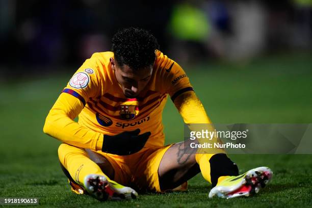 Raphinha right winger of Barcelona and Brazil lies injured on the pitch during the Copa Del Rey match between UD Barbastro and FC Barcelona at Campo...