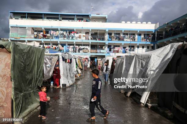 Rainbow is appearing over the makeshift shelters in Deir El-Balah, in the central Gaza Strip, on January 11 amid ongoing battles between Israel and...