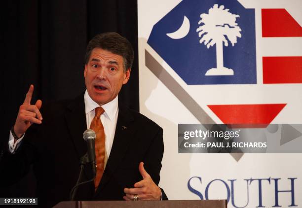 Republican presidential hopeful Texas Governor Rick Perry addresses the South Carolina Chamber of Commerce January 17 in Columbia, South Carolina, in...