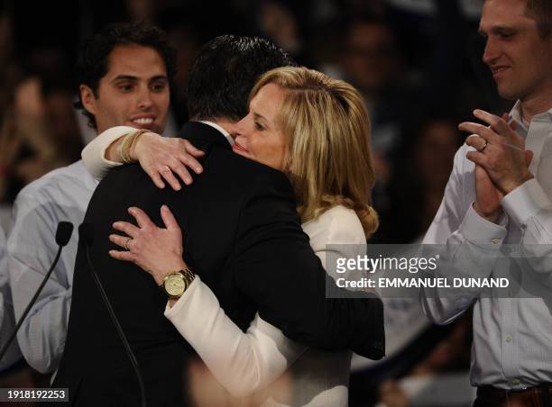 Republican presidential hopeful Mitt Romney and his wife Ann embrace January 10, 2012 in Manchester after Romney seized a second victory in his fight...