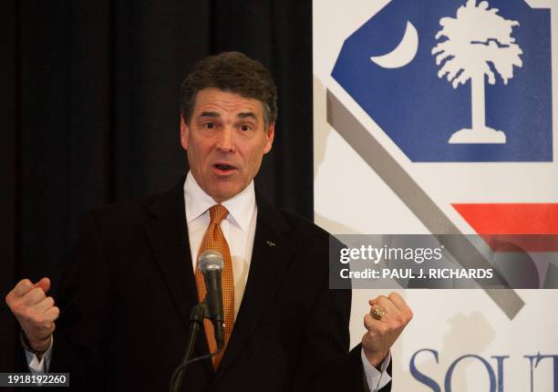 Republican presidential hopeful Texas Governor Rick Perry addresses the South Carolina Chamber of Commerce January 17 in Columbia, South Carolina, in...