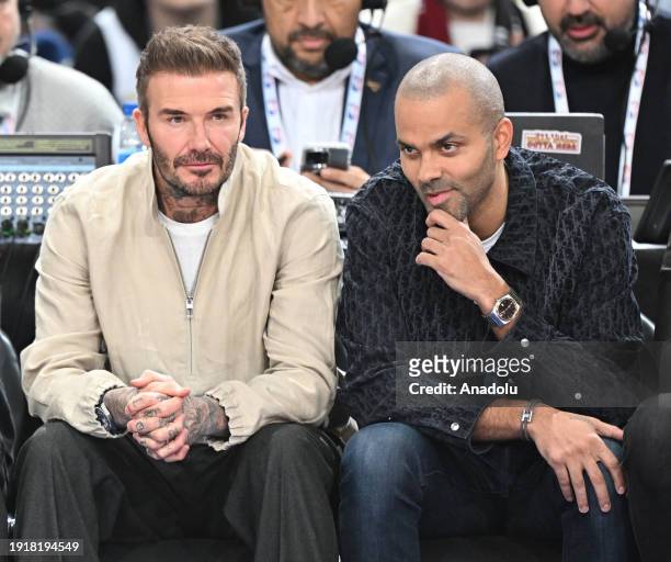 English former football player David Beckham and American-French former basketball player Tony Parker attend the Paris Game 2024 match between...