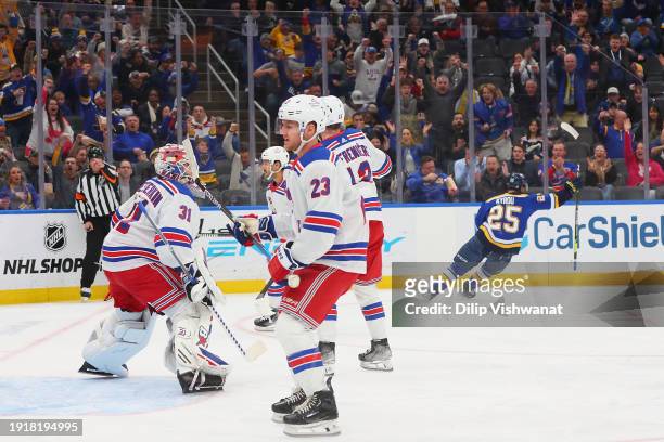 Adam Fox of the New York Rangers reacts as Jordan Kyrou of the St. Louis Blues celebrates after scoring a goal against the New York Rangers in the...