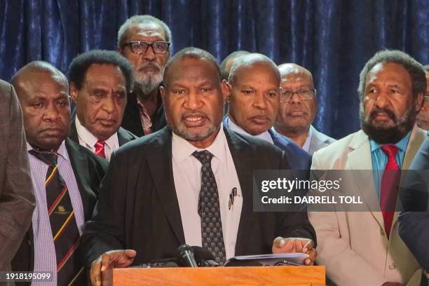 This frame grab taken from AFPTV video footage taken on January 11, 2024 shows Papua New Guinea's Prime Minister James Marape declaring a 14-day...