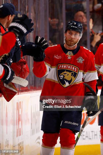 Sam Bennett of the Florida Panthers celebrates his goal with teammates during the second period against the Los Angeles Kings at the Amerant Bank...