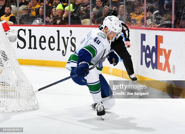 Elias Pettersson of the Vancouver Canucks celebrates his overtime goal against the Pittsburgh Penguins at PPG PAINTS Arena on January 11, 2024 in...