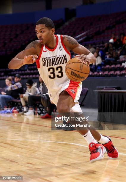 Malcolm Hill of the Birmingham Squadron dribbles the ball during the game against the Memphis Hustle on January 11, 2024 at Landers Center in...