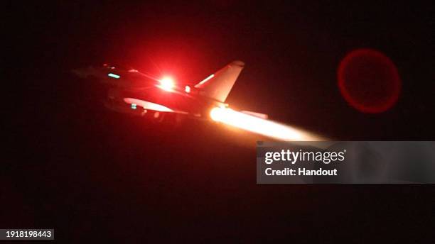 In this handout image provided by the UK Ministry of Defence, an RAF Typhoon aircraft takes off from RAF Akrotiri to join the U.S.-led coalition to...