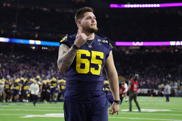 Zak Zinter of the Michigan Wolverines reacts prior to the 2024 CFP National Championship game against the Washington Huskies at NRG Stadium on...