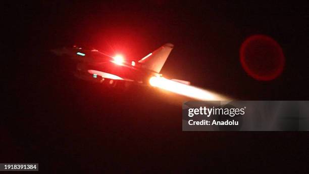 An RAF FGR4 Typhoon takes off from Royal Air Force Akrotiri military airbase in Greek Cypriot to conduct its mission against the Iranian-backed...