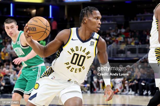 Bennedict Mathurin of the Indiana Pacers dribbles the ball against the Boston Celtics at Gainbridge Fieldhouse on January 08, 2024 in Indianapolis,...
