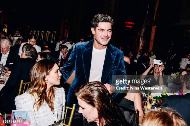 Elizabeth Olsen, Zac Efron and Maura Tierney at The National Board of Review Awards Gala held at Cipriani 42nd St on January 11, 2024 in New York,...