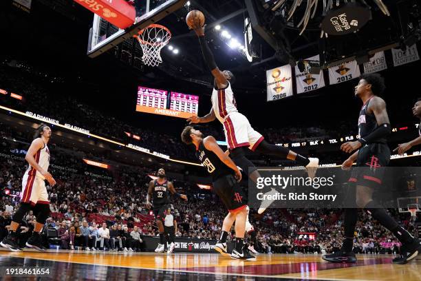 Bam Adebayo of the Miami Heat goes up for a shot over Alperen Sengun of the Houston Rockets during the second quarter at Kaseya Center on January 08,...