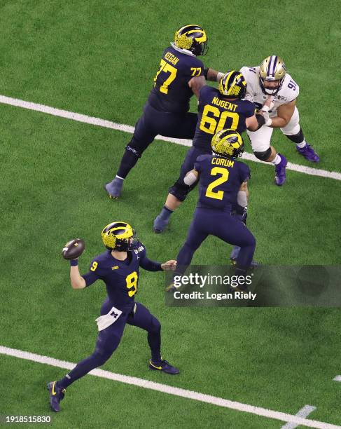 McCarthy of the Michigan Wolverines throws the ball in the second quarter against the Washington Huskies during the 2024 CFP National Championship...